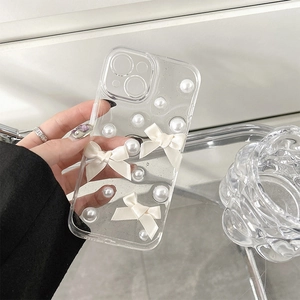 Coque iPhone transparente scintillante avec perles blanches et nœuds en soie