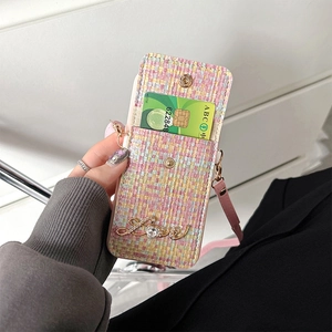 Pink tweed phone case detail with credit card slot and detachable crossbody strap