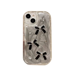 Coque iPhone scintillante avec texture 3D argentée, nœuds noirs et strass brillants