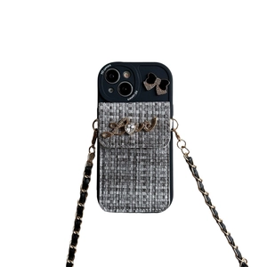 iPhone case with cross-body chain, tweed wallet pouch and rhinestone love logo