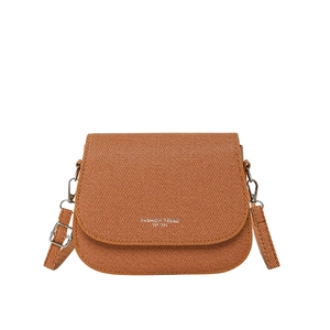 Caramel brown saddle bag with fine twill texture and adjustable strap on white background
