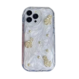 White pearl texture iPhone case with 3D gold floral accents and elegant pearls