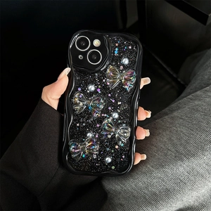 Black wave-edge iPhone case with laser gradient bows, pearls, and silver glitter sequins