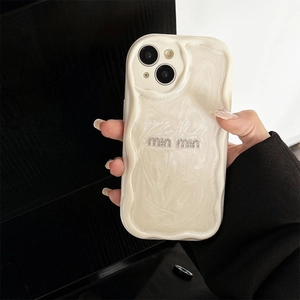 Creamy white iPhone case with pearl texture and 3D wavy edges featuring rhinestone logo