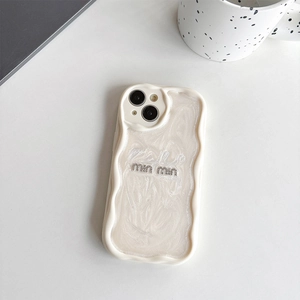 Detail of wavy cream phone case with mother-of-pearl texture and glitter logo for iPhone