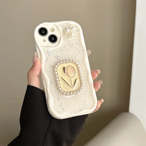 Close-up of glittery tulip phone case with 3D flower and elegant pearl details