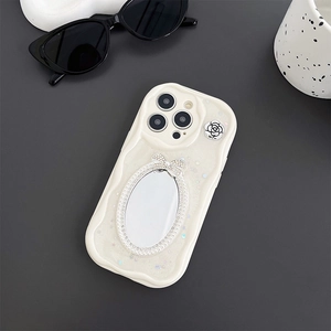 Cremeweiße iPhone Hülle mit Spiegel, funkelnden Pailletten, Schleife und Kamelie.