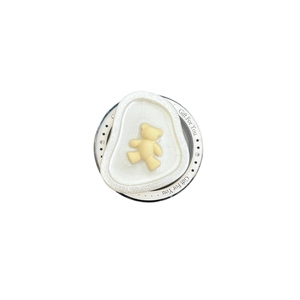Magnetic bear phone grip with frosted rock texture frame and yellow bear on metal base