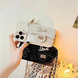 Quilted leather iPhone wallet case with gold Love hardware and crossbody chain strap