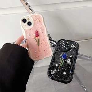 Glitzernde iPhone Hülle mit 3D-Tulpen, eleganten Perlen und dekorativen Schleifen-Motiven