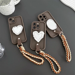 Brown iPhone case with oval heart mirror stand and woven hand strap in Korean style