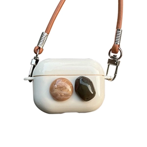 AirPods Pro silicone case with elegant lanyard strap and decorative gemstone accents