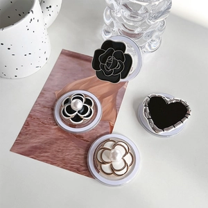 Magnetic camellia and heart phone socket grips with electroplated metal and pearl accents