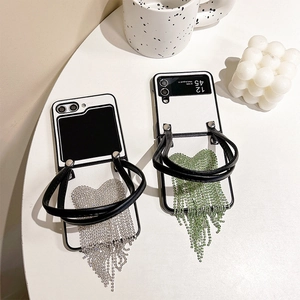 Coque de téléphone pliable avec dragonne en cuir et pampilles coeur en strass Z Flip 5