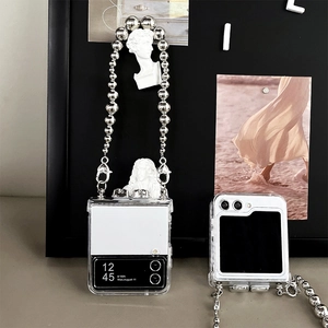 Transparent Samsung Galaxy Z Flip6 case with silver beaded strap and art bust charm