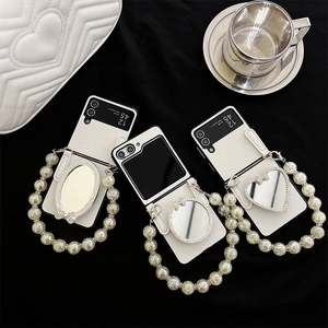Foldable PU Leather Phone Case With Rhinestone Makeup Mirror Bow And Beaded Chain Hand Strap Luxury Elegant Mirror Cover