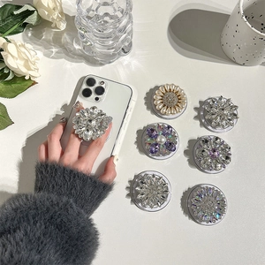 Luxurious floral rhinestone and pearl MagSafe phone grip stand in elegant white and purple