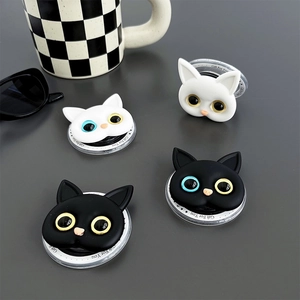 Cat head phone grip holder in black and white styles with magnetic suction feature