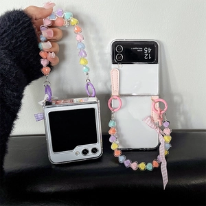 Transparent Samsung Galaxy Z Flip case with colorful heart bead chain and ribbon bow