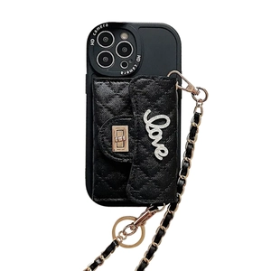 Quilted black leather iPhone case with Love lettering, rhinestone buckle and chain strap