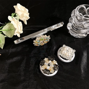 Magnetic MagSafe phone grip with luxury rhinestones pearls and gemstones on black velvet