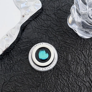 Close-up of magnetic heart phone grip with turquoise gemstone and Gift For You text