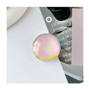Macro detail of a crystal ball phone socket with iridescent laser rainbow coating