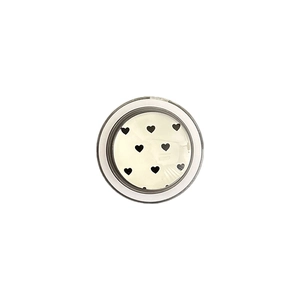 Crystal ball style phone socket featuring black hearts on cream base with clear finish