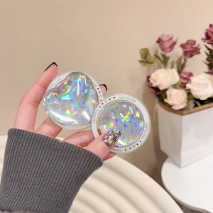 Macro detail of holographic laser phone grip featuring 3D heart and rainbow refraction