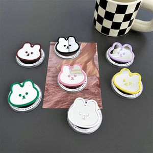 Vue détaillée de supports de téléphone lapin avec miroirs en sept couleurs variées