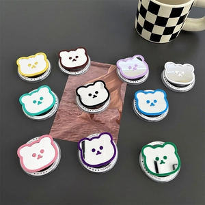 Macro shot of bear-shaped magnetic mirror phone grips in ten vibrant color options