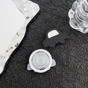 Glitter car-shaped phone grip with integrated mirror and white retractable stand base