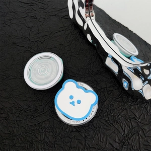 Detail of cute bear MagSafe griptok with mirror surface and transparent air cushion base