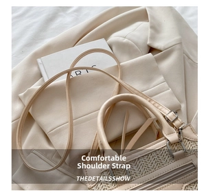 Detail of beige woven texture and leather trim on a stylish square crossbody bag