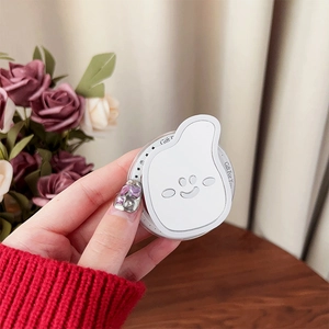 Close-up of white 3D smiley face phone grip with Gift For You engraving