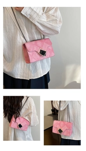 Detail of pink diamond-quilted chain bag showing rhombic gold buckle and styling options