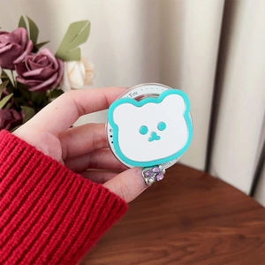 Detail of cute bear magnetic phone socket with mirror and for you printed card