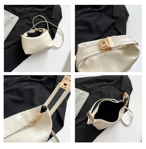 Detailed close-up of cream crossbody bag featuring checkered texture and gold hardware