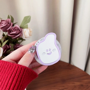 Detail of white smiling face phone grip with purple border and Gift For You text