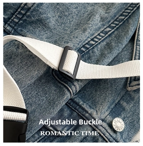 Detail of adjustable strap buckle and metal star jeans button on denim crossbody bag