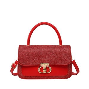 Elegant red sequin crossbody bag with gold twist lock and smooth leather handle for women