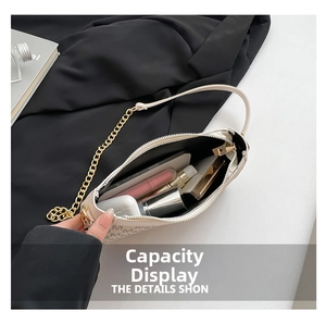 Interior view of beige crossbody bag showing space for phone, lipstick and perfume