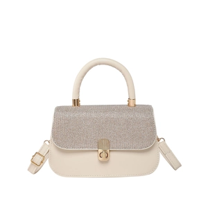 Chic cream small square handbag with textured glitter flap and gold circular handle