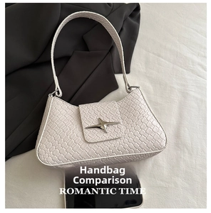 Beige woven texture underarm bag shown next to a smartphone for size comparison