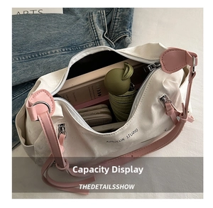 Detail showing high-capacity interior of canvas tote bag with book and wallet