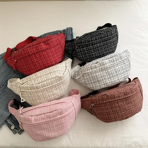 Collection of colorful tweed plaid waist bags for women featuring adjustable straps
