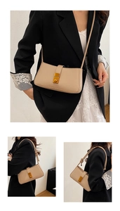 Detail of beige shoulder bag featuring a golden square lock and knotted strap design