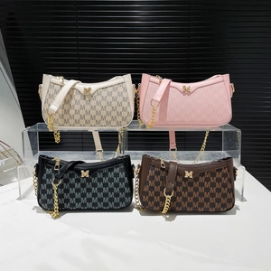 Minimalist crescent shoulder bags in four colors with gold M logo and chain strap