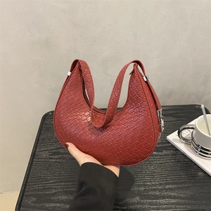 Elegant reddish-brown woven crescent hobo shoulder bag with silver clasp for women