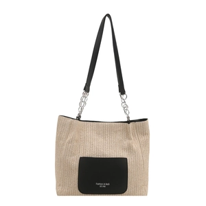 Chic straw tote bag with black leather pocket and chain strap for summer fashion